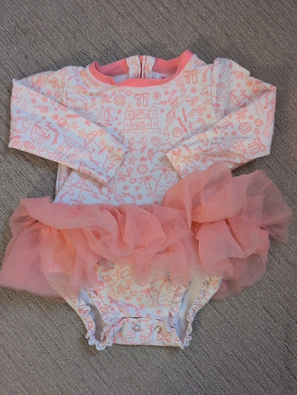 RuffleButts Toddler Long Sleeve Rash Guard Swimsuit With Attached Tulle Skirt 2T